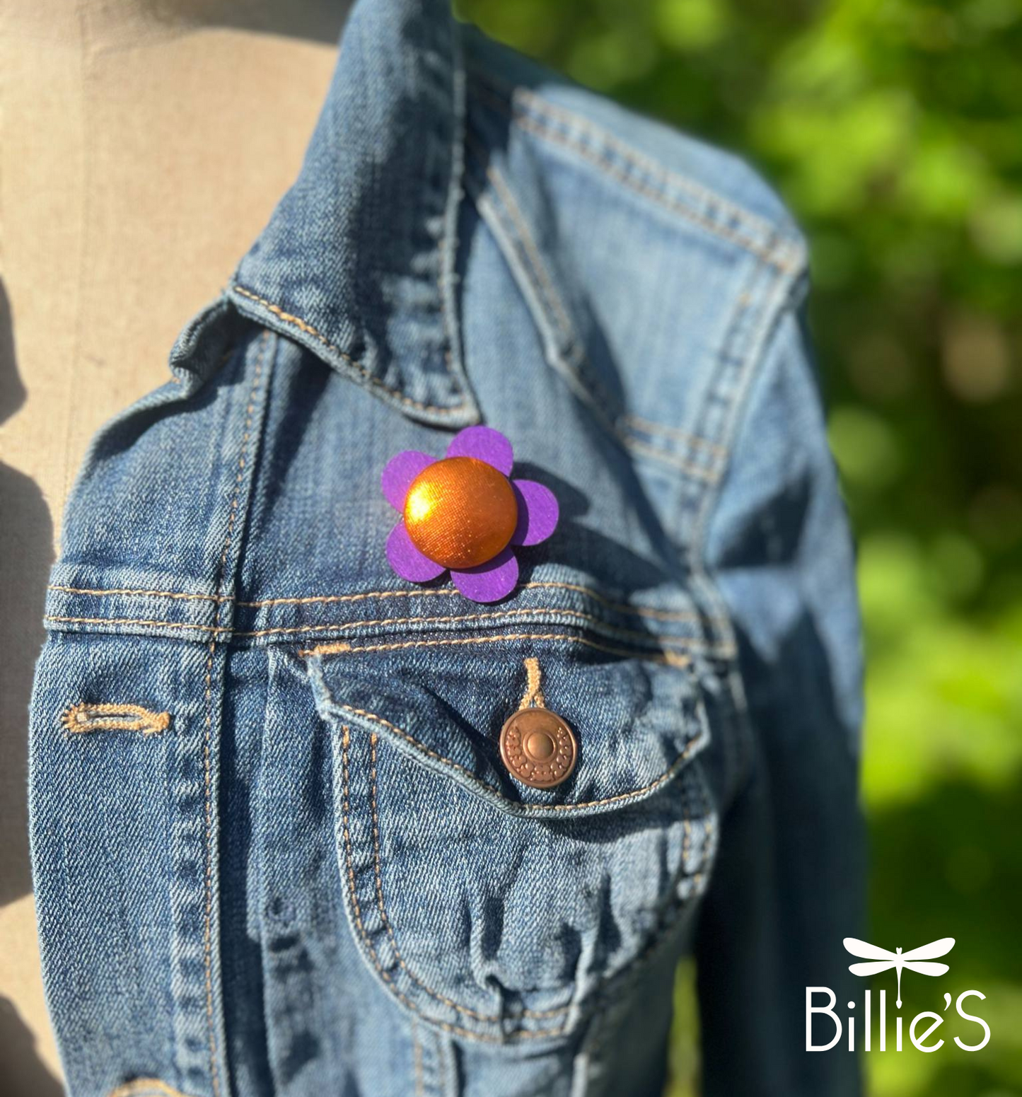 Broche mauve et orange