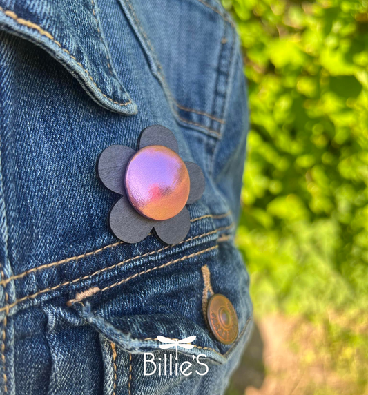 Broche noir et rose métallisé